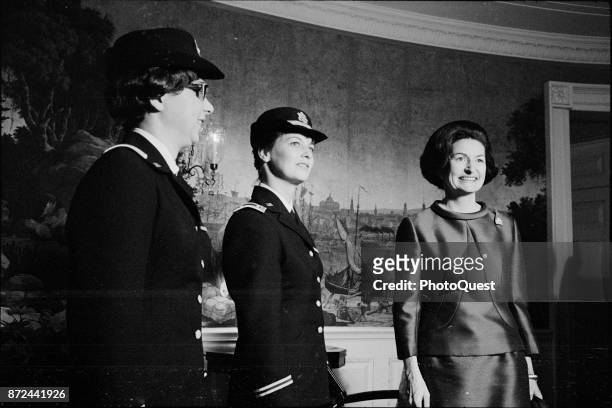 Army nurses and Vietnam veterans Julie Klebaum and Catherine Chilling pose with First Lady Lady Bird Johnson , Washington DC, November 18, 1965.
