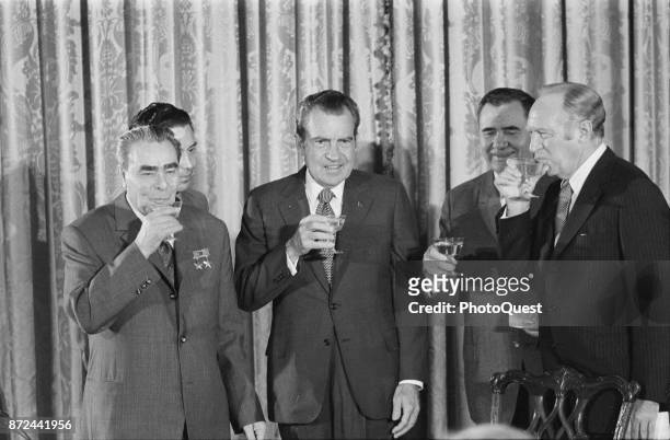 View of, from left, Soviet leader Leonid Brezhnev , Soviet translator Viktor Sukhodrev , US President Richard M Nixon , Soviet Minister of Foreign...
