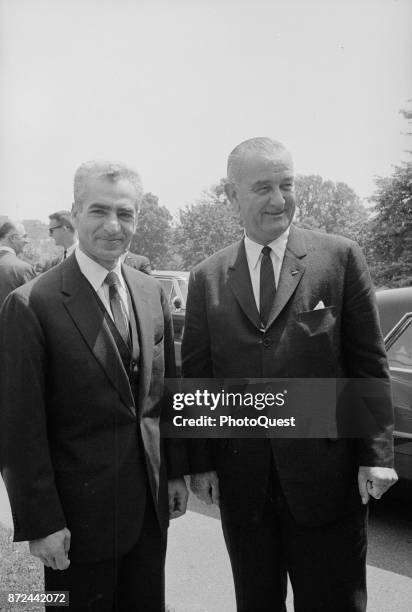 Shah of Iran Mohammad Reza Pahlavi poses with US President Lyndon B Johnson outside the White House, Washington DC, June 5, 1964.