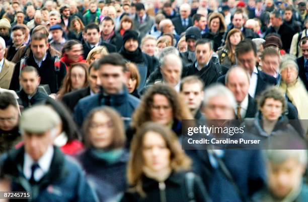 crowd of commuters at rush hour - 通勤 ストックフォトと画像