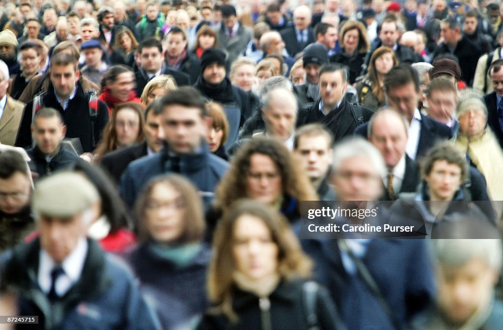 Crowd of commuters at rush hour