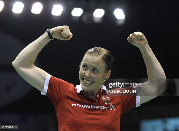 Denmark's Kamilla Rytter Juhl celebrates after winning over Britain's Jennifer Wallwork and Donna Kellog during the women's doubles play-off match at...