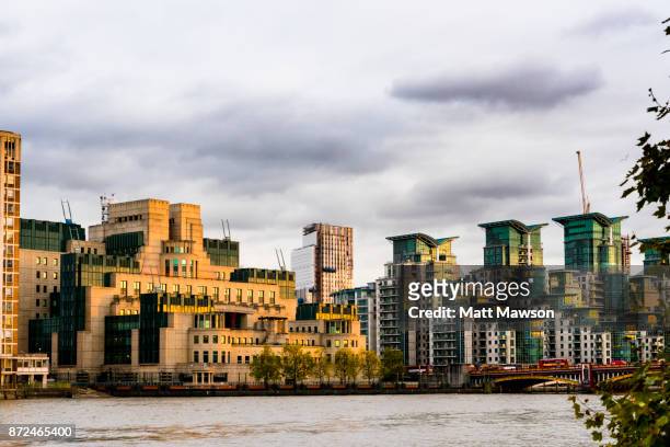 the sis building or mi6 building and st. george wharf at vauxhall cross london uk - headquarters of the british secret intelligence service stock pictures, royalty-free photos & images