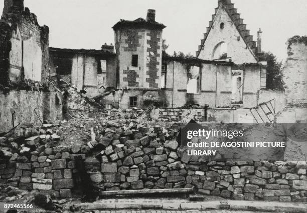 Houses burned with petroleum by the Germans during the retreat, Senlis, at Chantilly, France, World War I, photo sent by Guglielmo Marconi from...