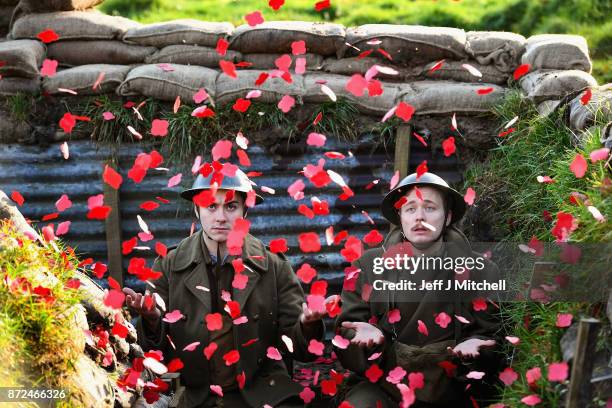 Actors Sam Duncane and Jake Morgan, from the Somme-inspired West End production The Wipers Times pose for photographs in a recreated First World War...