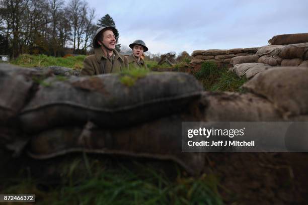 Actors Sam Duncane and Jake Morgan, from the Somme-inspired West End production The Wipers Times pose for photographs in a recreated First World War...