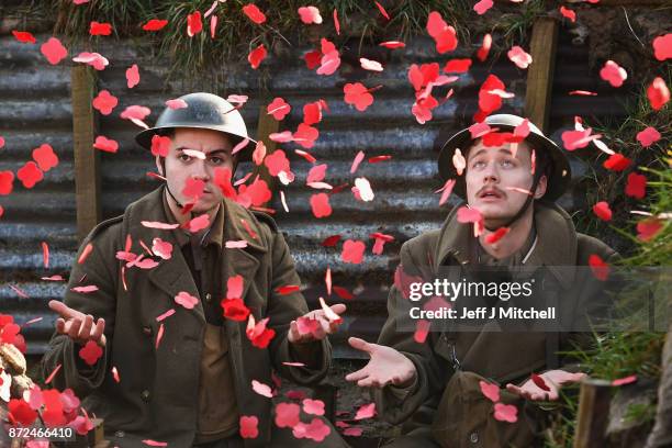 Actors Sam Duncane and Jake Morgan, from the Somme-inspired West End production The Wipers Times pose for photographs in a recreated First World War...