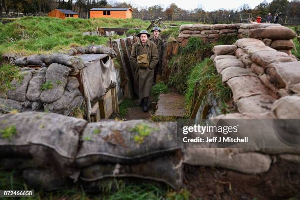 Actors Sam Duncane and Jake Morgan, from the Somme-inspired West End production The Wipers Times pose for photographs in a recreated First World War...