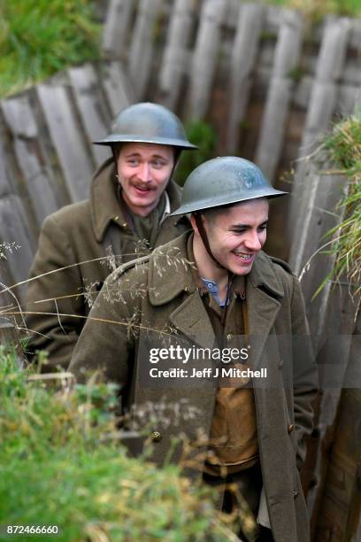 Actors Sam Duncane and Jake Morgan, from the Somme-inspired West End production The Wipers Times pose for photographs in a recreated First World War...