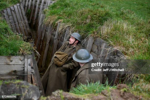 Actors Sam Duncane and Jake Morgan, from the Somme-inspired West End production The Wipers Times pose for photographs in a recreated First World War...