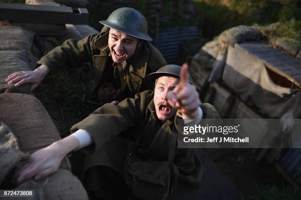 Actors Sam Duncane and Jake Morgan, from the Somme-inspired West End production The Wipers Times pose for photographs in a recreated First World War...