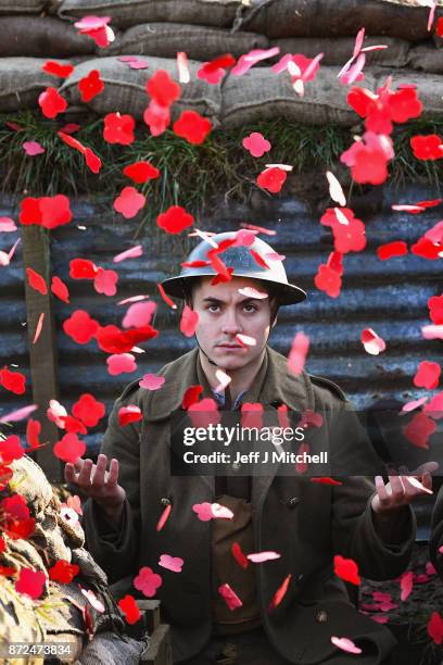 Actor Jake Morgan, from the Somme inspired West End production The Wipers Times poses for photographs in a recreated First World War trench in...