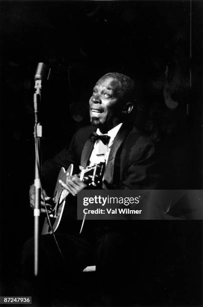 American musician, singer and songwriter Nehemiah Curtis James, known as Skip James , in concert, circa 1960.