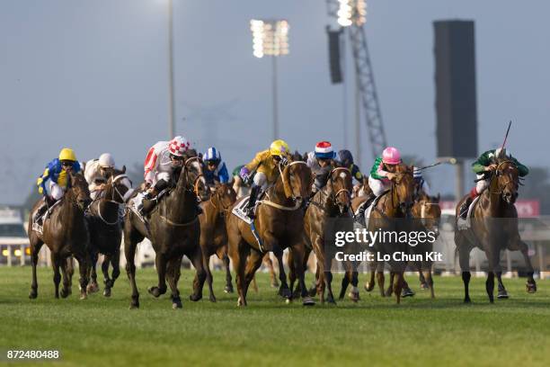 Jockey Richard Hughes riding Sole Power wins in the Al Quoz Sprint during the Dubai World Cup race day at the Meydan racecourse on March 28, 2015 in...