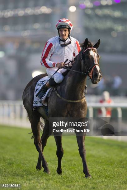 Jockey Richard Hughes riding Sole Power wins in the Al Quoz Sprint during the Dubai World Cup race day at the Meydan racecourse on March 28, 2015 in...