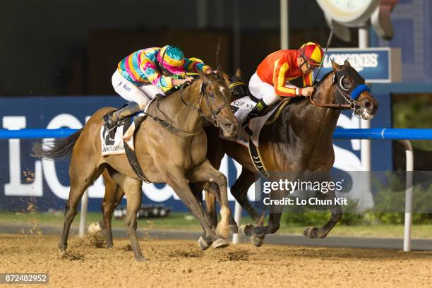 Jockey Victor Espinoza riding Secret Circle wins the Dubai Golden Shaheen during the Dubai World Cup race day at the Meydan racecourse on March 28,...