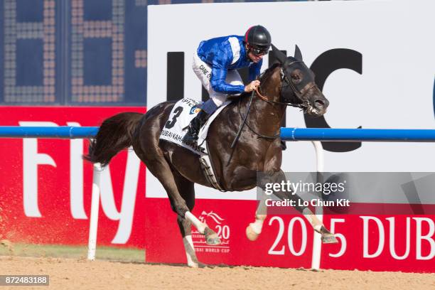 Jockey Dane O'Neill riding Manark wins the Dubai Kahayla Classic during the Dubai World Cup race day at the Meydan racecourse on March 28, 2015 in...