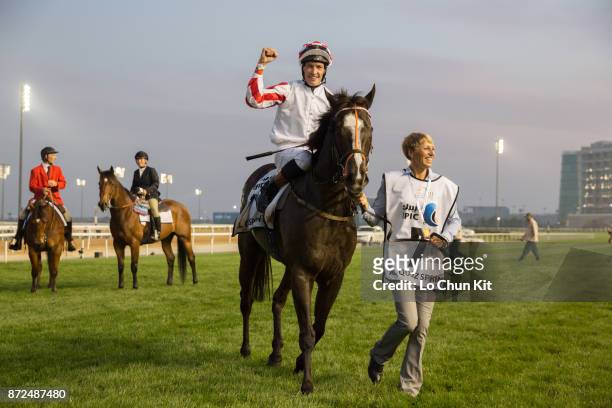 Jockey Richard Hughes riding Sole Power wins in the Al Quoz Sprint during the Dubai World Cup race day at the Meydan racecourse on March 28, 2015 in...