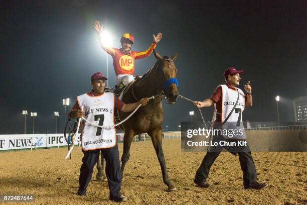 Jockey Victor Espinoza riding Secret Circle wins the Dubai Golden Shaheen during the Dubai World Cup race day at the Meydan racecourse on March 28,...