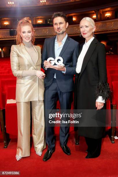 German presenter Palina Rojinski, German actor Simon Verhoeven and Christiane Arp, chief editor Vogue magazine Germany during the GQ Men of the year...