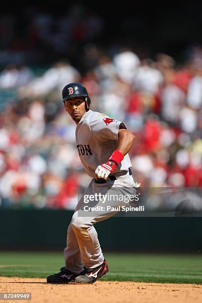 Julio Lugo of the Boston Red Sox gets caught in a rundown between second and third base in the top of the 10th inning during the game against the Los...