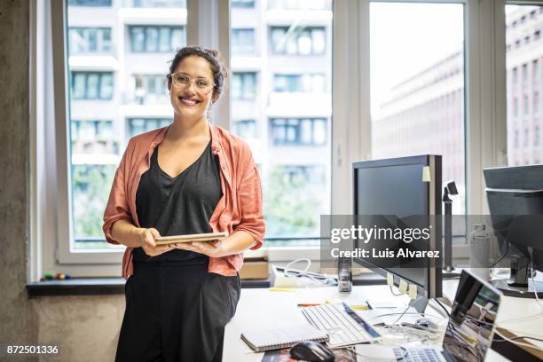 portrait of a confident business woman - hair back stock pictures, royalty-free photos & images