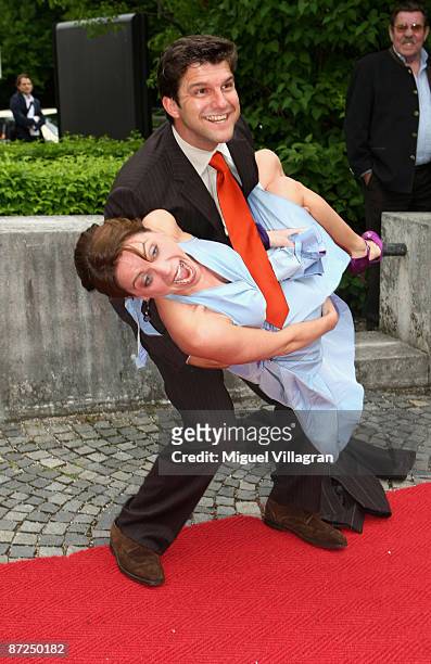 Actors Jens Peter Nuenemann and Gisa Zach joke while attending the Bavarian Television Award 'Baluer Panther' 2009 at the Prinzregententheater on May...