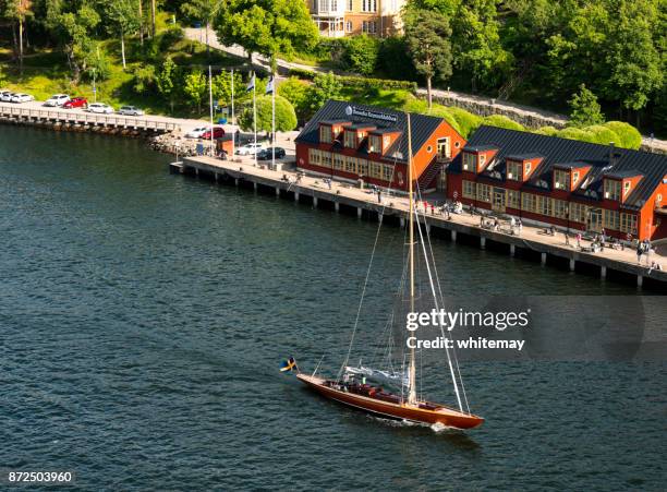 sunny day at nacka strand, near stockholm - waters edge stock pictures, royalty-free photos & images