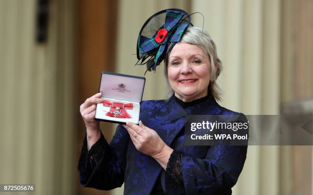 Angela Malone after she was awarded an MBE by the Duke of Cambridge at an Investiture ceremony at Buckingham Palace on November 10, 2017 in London,...