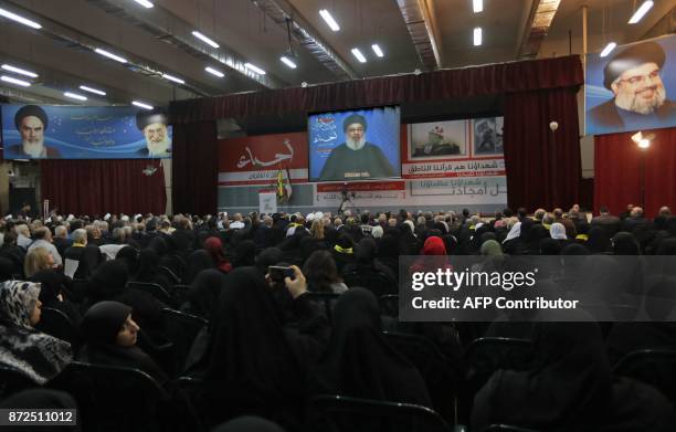 Picture taken on November 10 shows Hassan Nasrallah, the head of Lebanon's militant Shiite movement Hezbollah, giving a televised address during a...