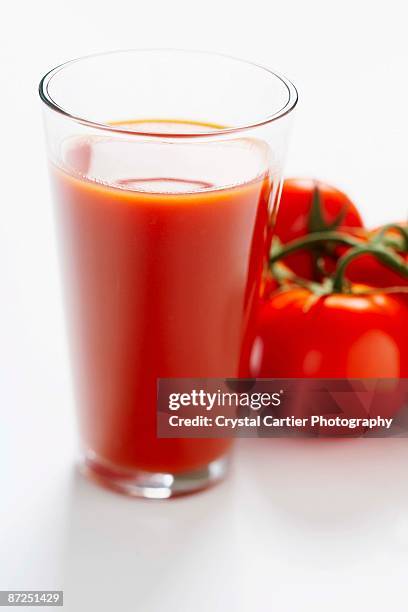 tomato juice - crystal glasses stockfoto's en -beelden