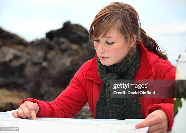 woman reading map - david oldfield stock pictures, royalty-free photos & images