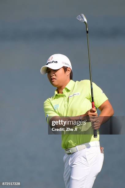 Haru Nomura of Japan plays a shot on the 7th hole during the third round of the Blue Bay LPGA at Jian Lake Blue Bay golf course on November 10, 2017...