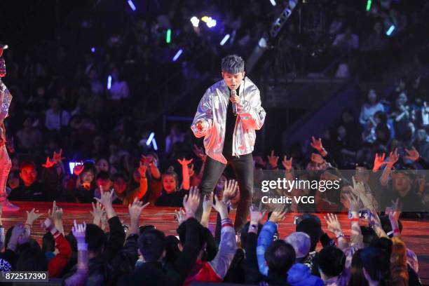 Singer Zhang Jie performs on the stage during 2017 Alibaba Singles' Day Global Shopping Festival gala at Mercedes-Benz Arena on November 10, 2017 in...