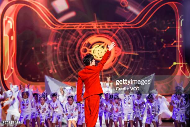 Singer Dimash Kudaibergen performs on the stage during 2017 Alibaba Singles' Day Global Shopping Festival gala at Mercedes-Benz Arena on November 10,...