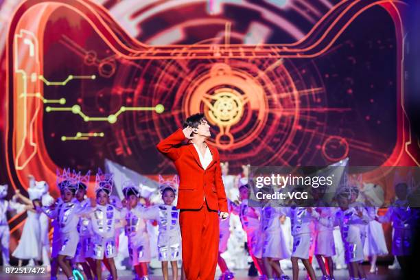 Singer Dimash Kudaibergen performs on the stage during 2017 Alibaba Singles' Day Global Shopping Festival gala at Mercedes-Benz Arena on November 10,...