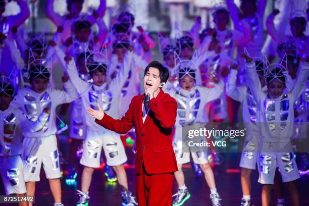 Singer Dimash Kudaibergen performs on the stage during 2017 Alibaba Singles' Day Global Shopping Festival gala at Mercedes-Benz Arena on November 10,...