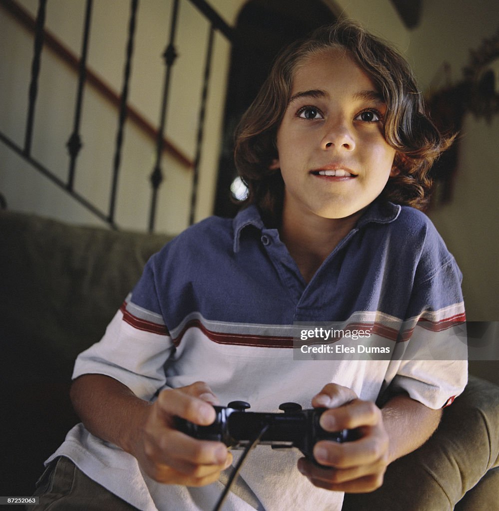 Boy playing video game