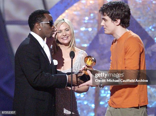 Sean "P. Diddy" Combs and Kim Cattrall present a GRAMMY to John Mayer