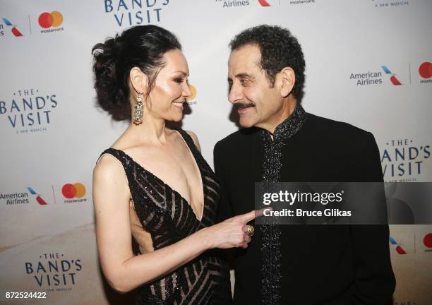 Katrina Lenk and Tony Shalhoub pose at the opening night after party for the new musical "The Band's Visit" on Broadway at The Copacabana on November...