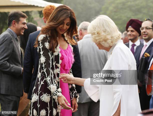 Camilla, Duchess of Cornwall meets Shilpa Shetty during a reception at the High Commissioner's Residence during a visit to India on November 9, 2017...