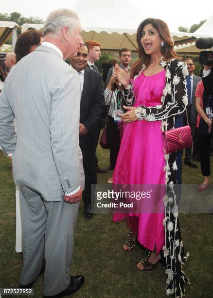 Prince Charles, Prince of Wales meets Shilpa Shetty during a reception at the High Commissioner's Residence during a visit to India on November 9,...