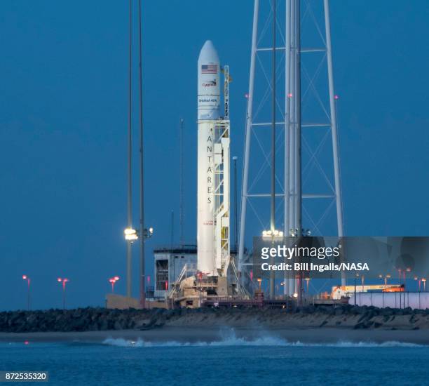 The Orbital ATK Antares rocket, with the Cygnus spacecraft onboard, is seen on launch Pad-0A, November 10, 2017 at NASA's Wallops Flight Facility in...