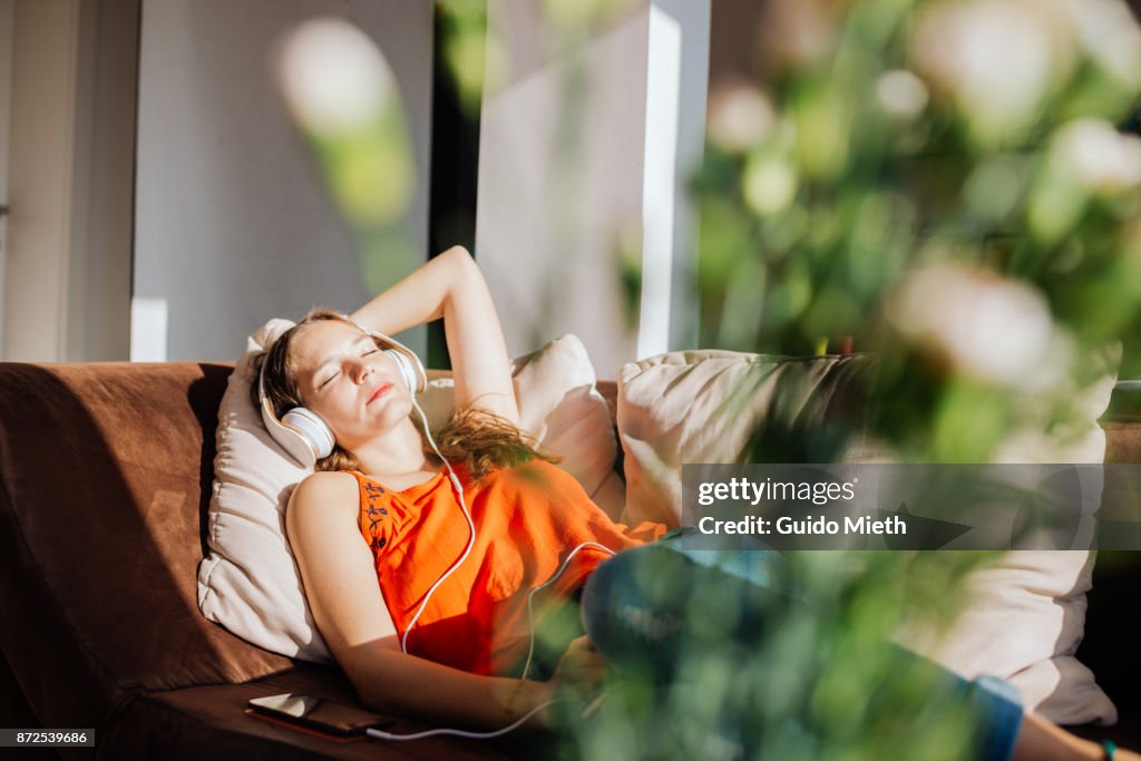 Woman relaxing in sunlight.