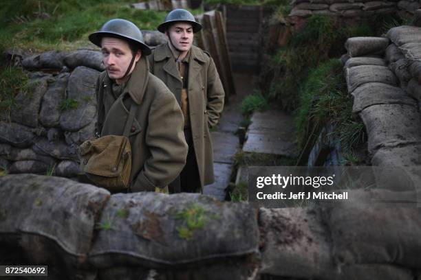 Actors Sam Duncane and Jake Morgan, from the Somme-inspired West End production The Wipers Times pose for photographs in a recreated First World War...