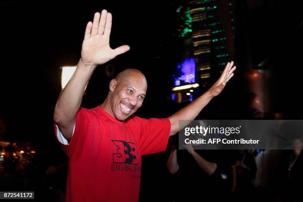 LaVar Ball, father of LiAngelo Ball and the owner of the Big Baller brand, waves during a promotional event in Shanghai on November 10, 2017....