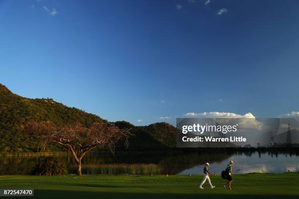 Julian Suri of the USA walks down the 17th hole during the second round of the Nedbank Golf Challenge at Gary Player CC on November 10, 2017 in Sun...