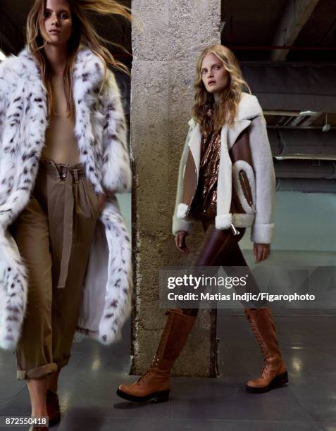 Models Estee Rammant and Nathalia O pose at a fashion shoot for Madame Figaro on September 19, 2017 in Paris, France. Left: Coat , body , pants ,...