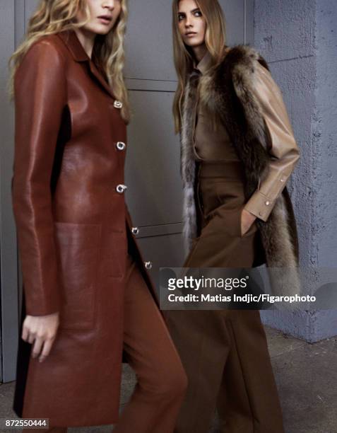 Models Estee Rammant and Nathalia O pose at a fashion shoot for Madame Figaro on September 19, 2017 in Paris, France. Left: Coat and pants . Right:...