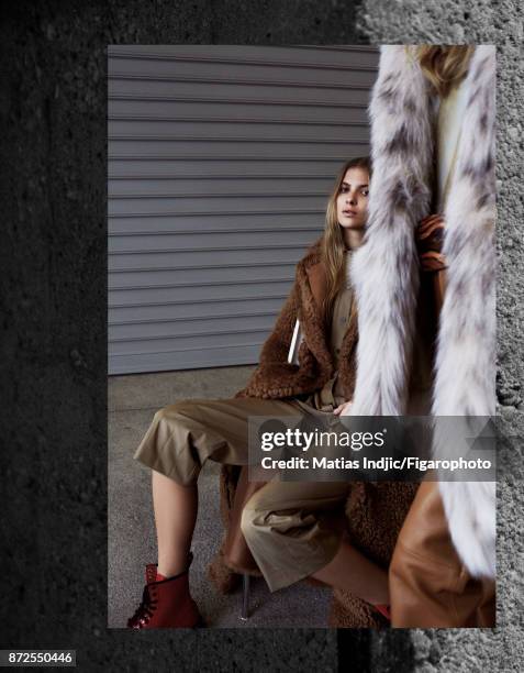 Models Estee Rammant and Nathalia O pose at a fashion shoot for Madame Figaro on September 19, 2017 in Paris, France. Front: Coat , body, pants and...